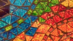 Gender, sexual and relationship diversity (GSRD/LGBT+) counselling Leicester represented by a colourful mosaic
